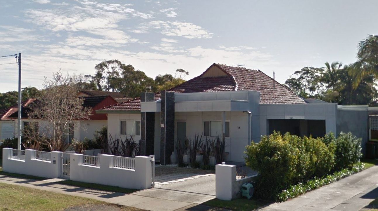 Before: the original single storey brick house on the Caringbah site with terracotta tile roof, prior to demolition