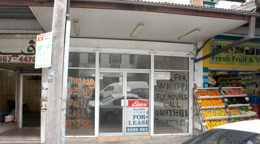 Before: the vacant Rockdale shopfront with For Lease signage prior to the cafe fit-out